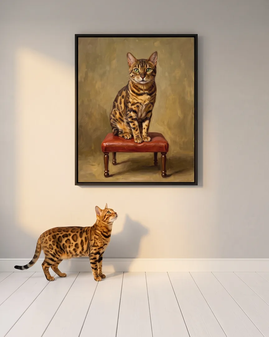 Jasper, a Bengal, beside a black framed canvas of their own Conservatory Perch portrait.