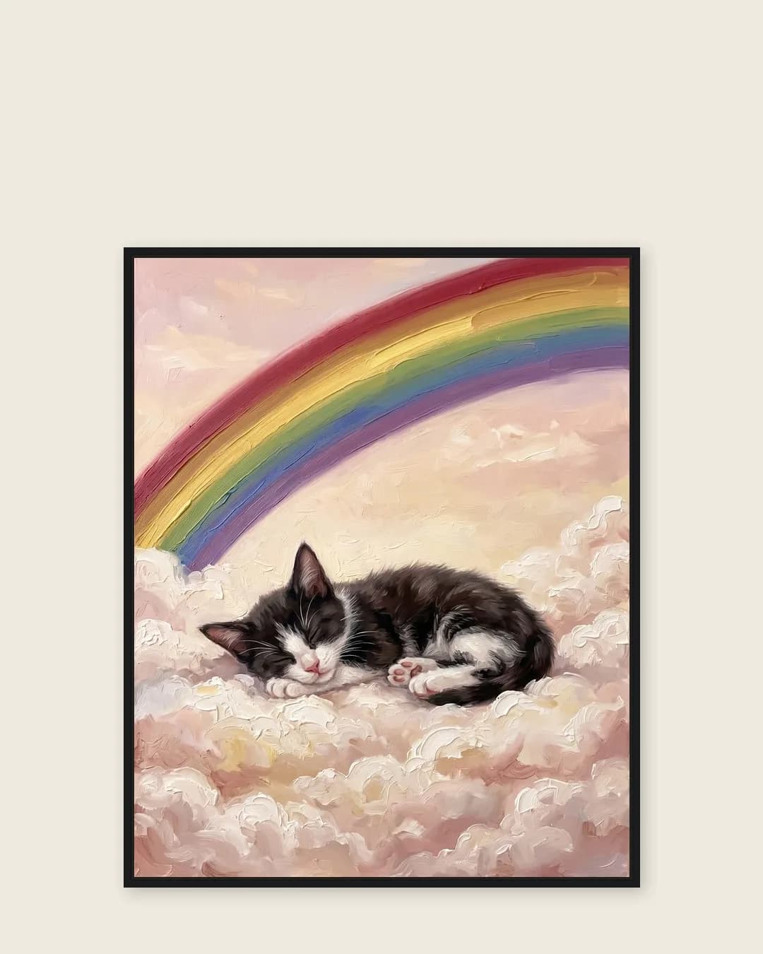 A black float-framed canvas of Oreo, a tuxedo domestic shorthair kitten, a gentle Gentle Skies portrait kept close.