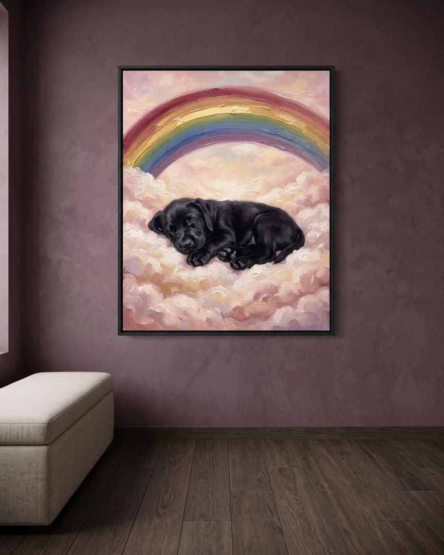 A black framed canvas of Bear, a black Labrador retriever puppy, a Gentle Skies portrait, hung above a low bench.