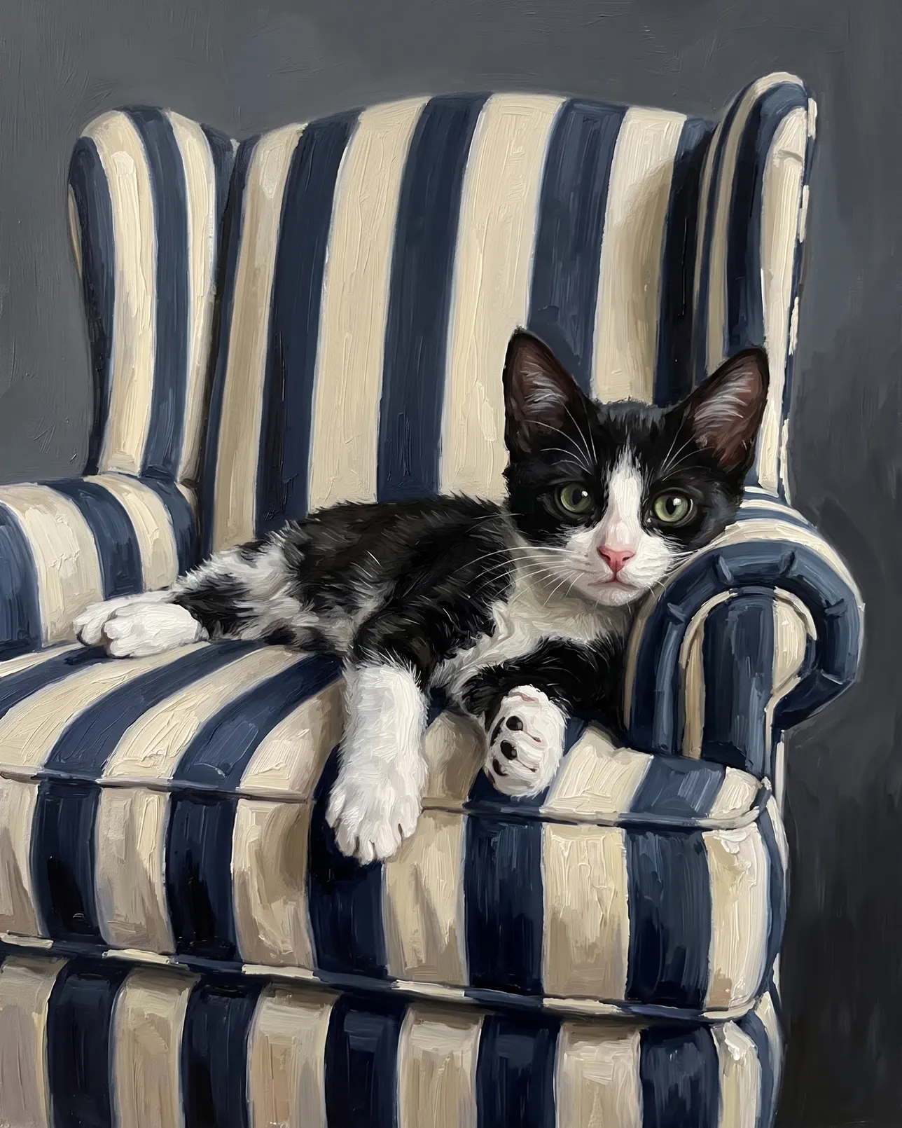 Oreo, un chaton smoking, exemple Le Fauteuil.
