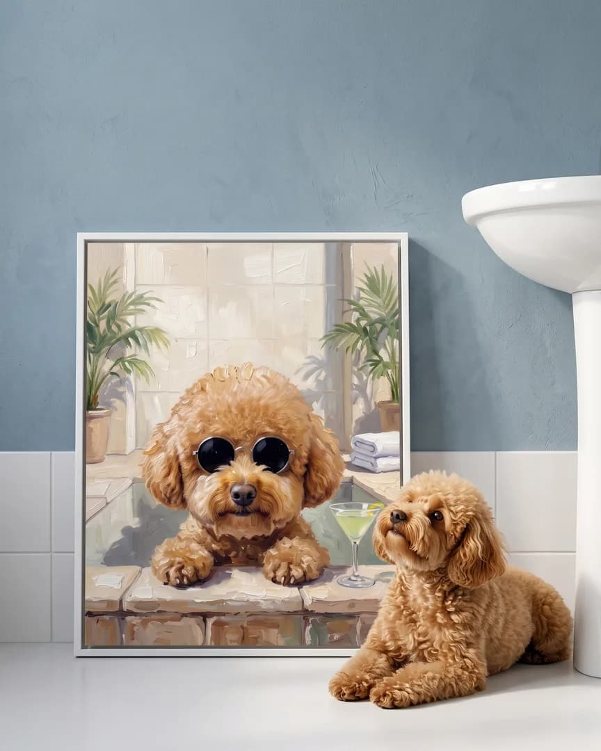 Mimi, a toy poodle, beside a white framed canvas of their own Tub Edge Shades portrait.