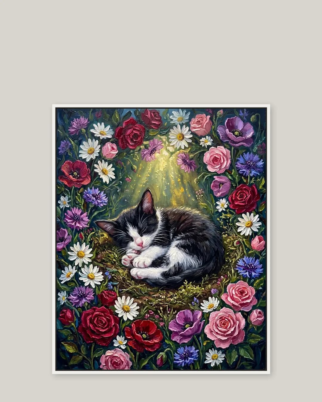 A white float-framed canvas of Oreo, a tuxedo domestic shorthair kitten, a gentle Wildflower Rest portrait kept close.