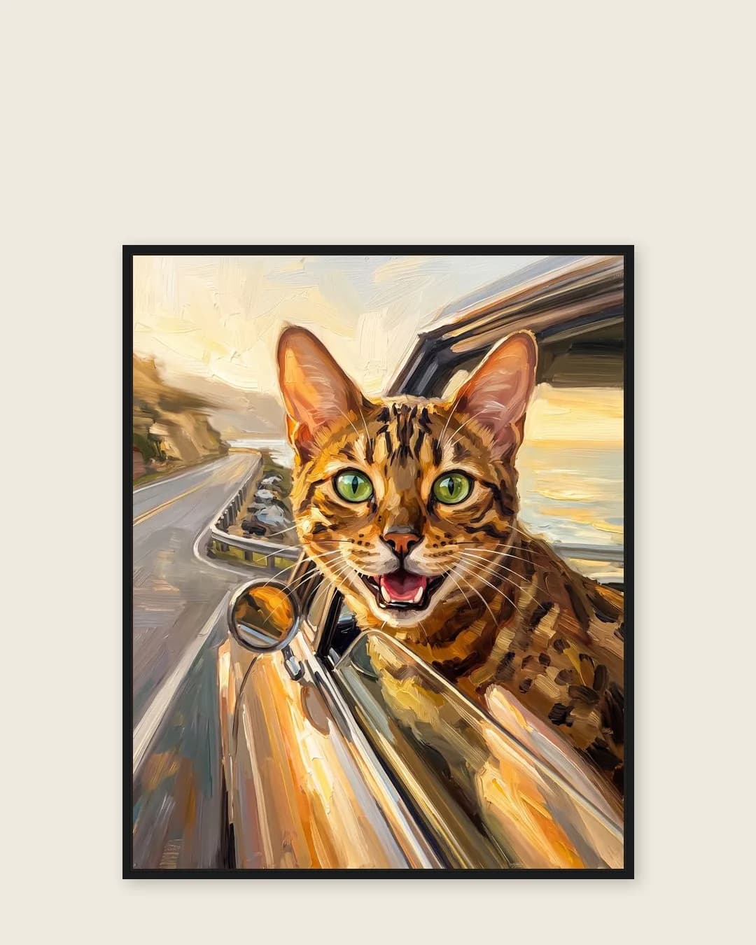 A black float-framed canvas of Jasper, a Bengal, a gentle Wind and Waves portrait kept close.